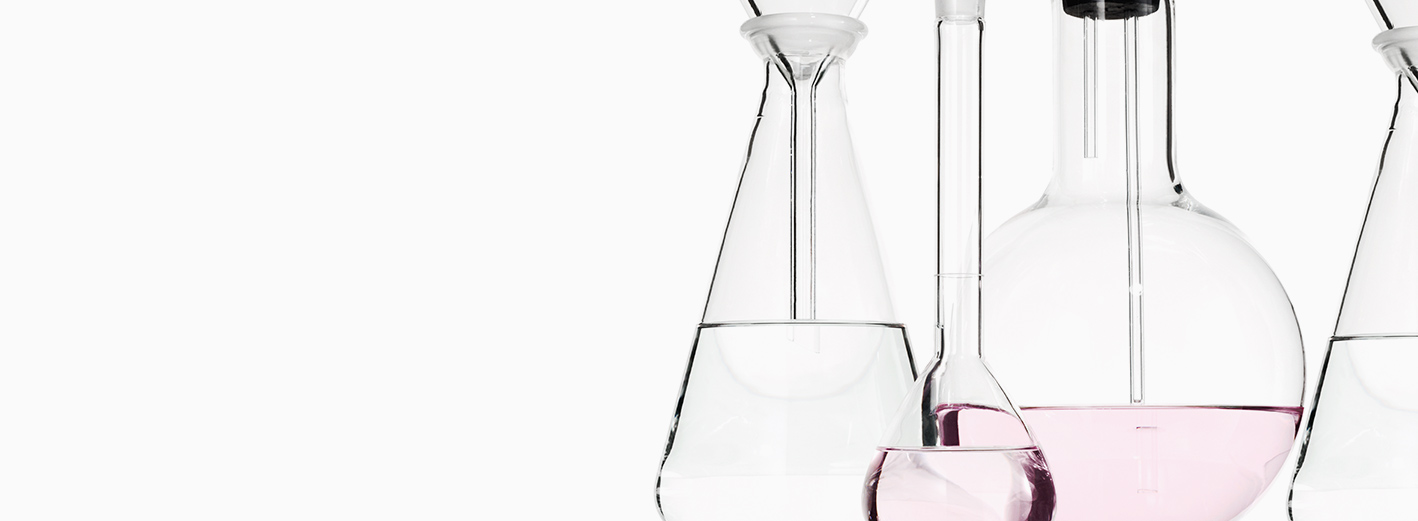 Image of laboratory vials and beakers representing research and development efforts of Mary Kay scientists