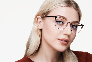 Model wearing glasses representing Mary Kay eye area product testing. 