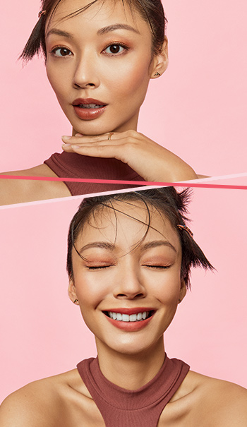 Una mujer asiática sonriente con piel reluciente y maquillaje mínimo 