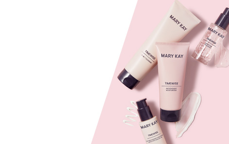 Mary Kay TimeWise Miracle Set 3D® products set against a pink background with three clear disks.